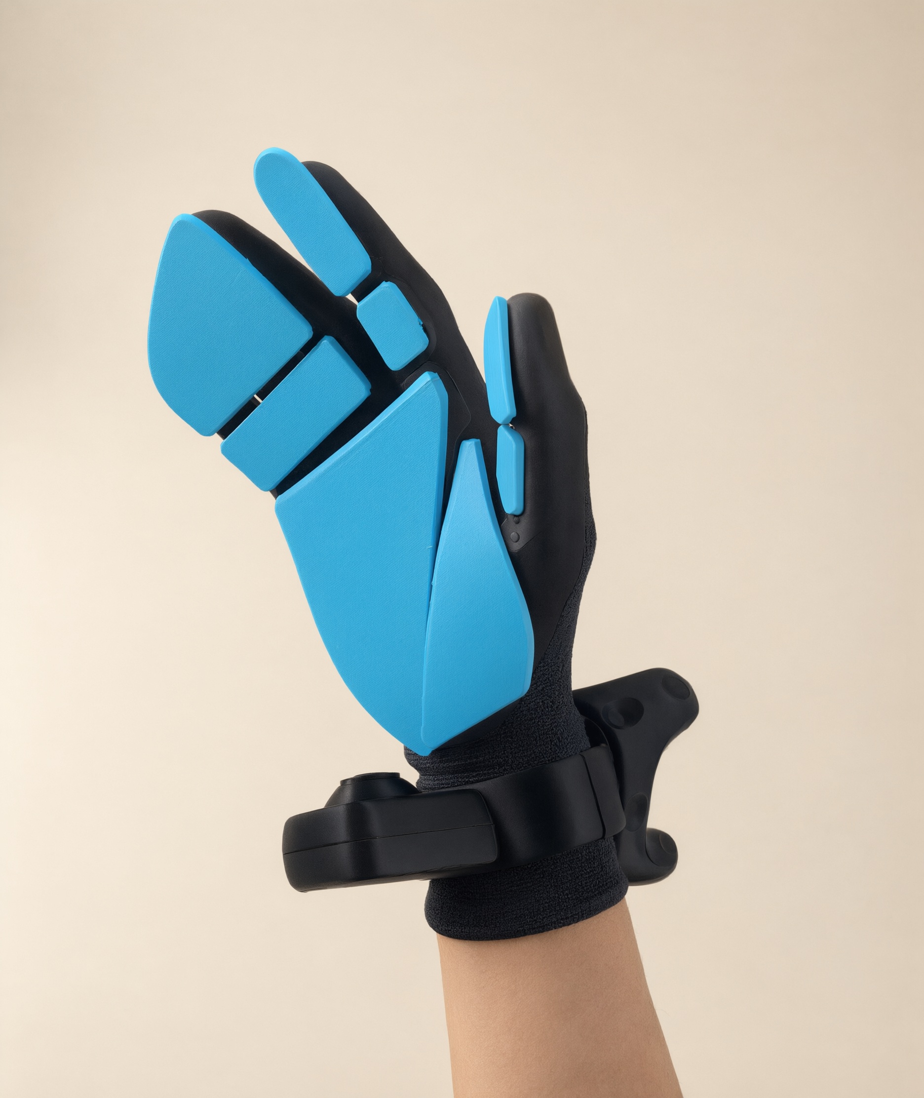 Prototype sensor glove with blue backing plates and wrist module